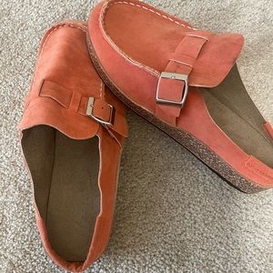 Orange slip ons